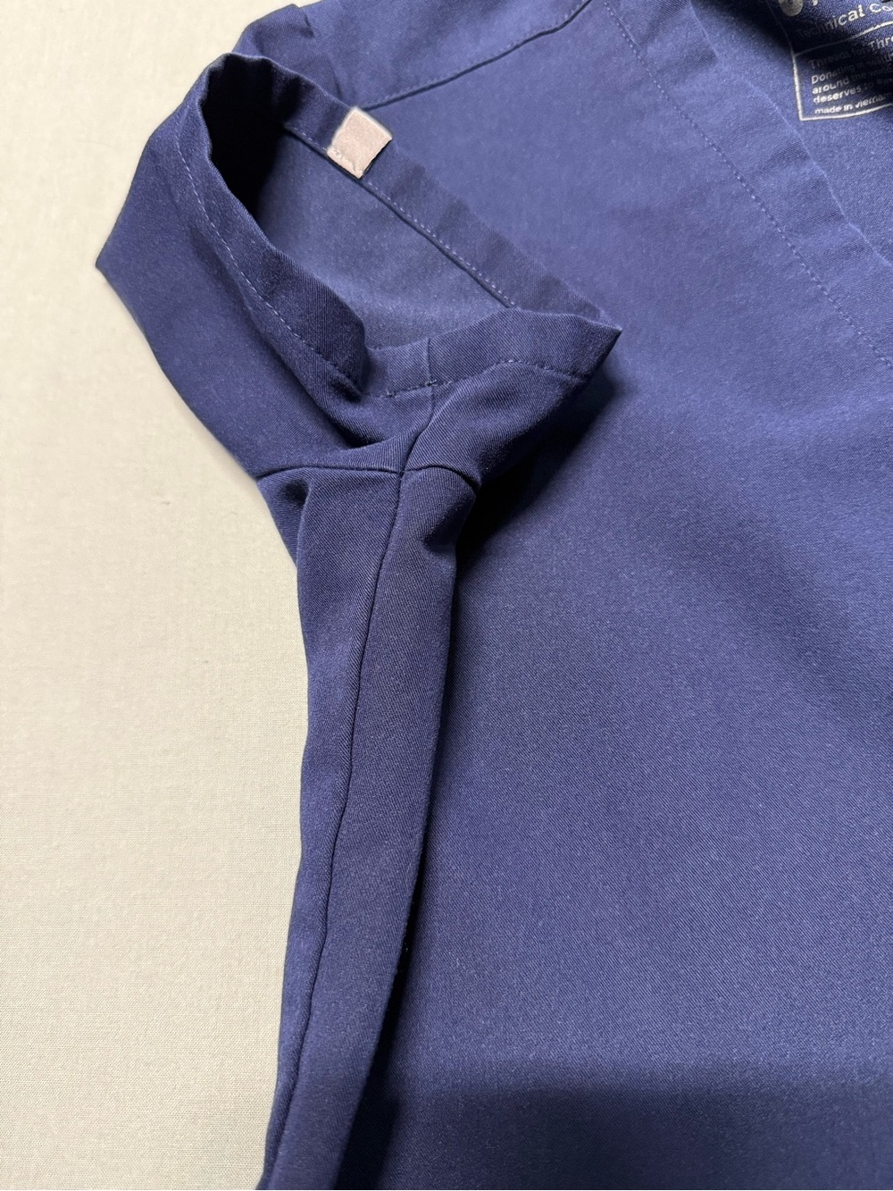 FIGS Technical Collection Scrub Top Uniform in Navy Blue - Picture 4 of 5